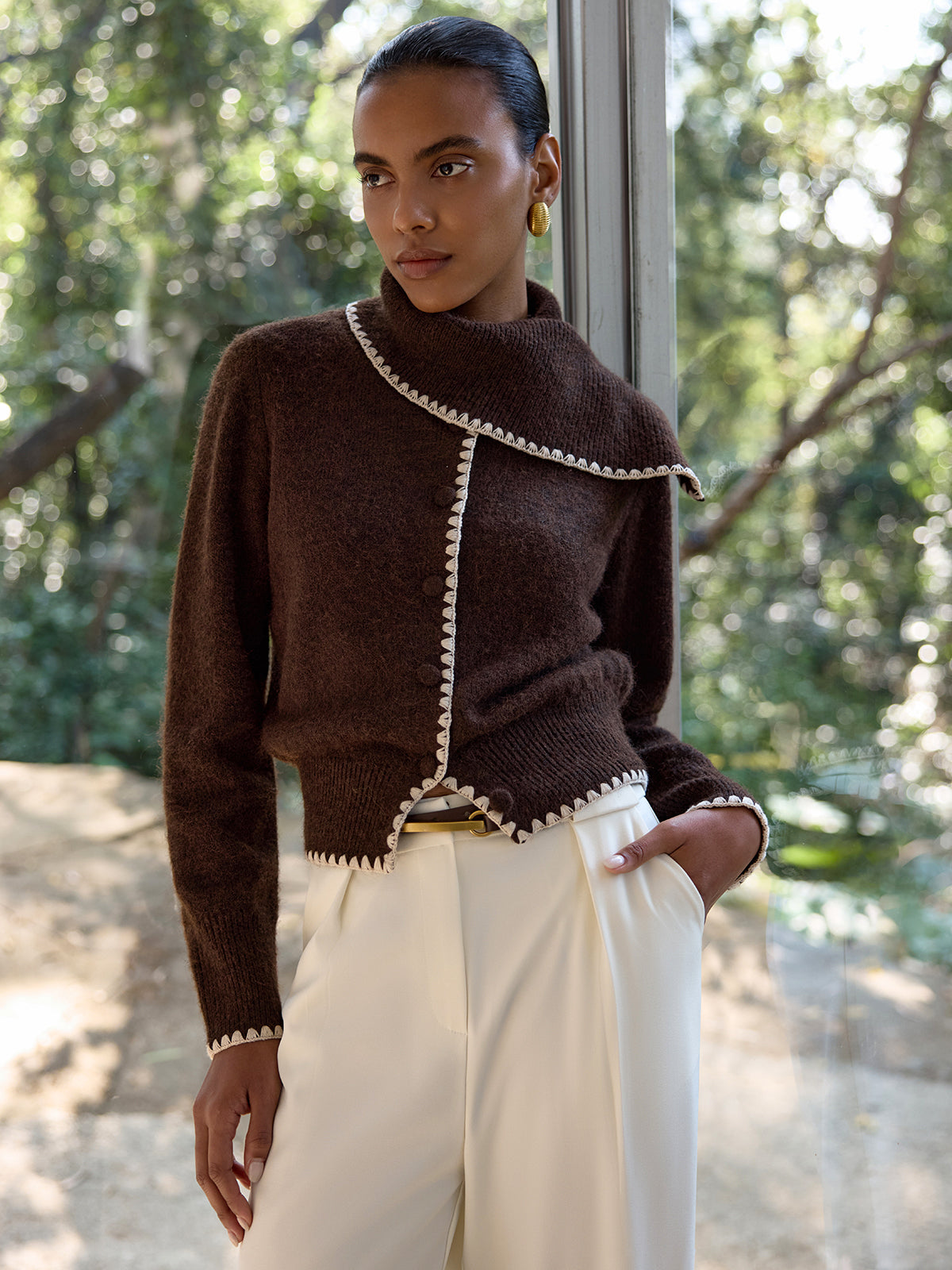 Armelle brown and cream cardigan with the collar swept to one shoulder
