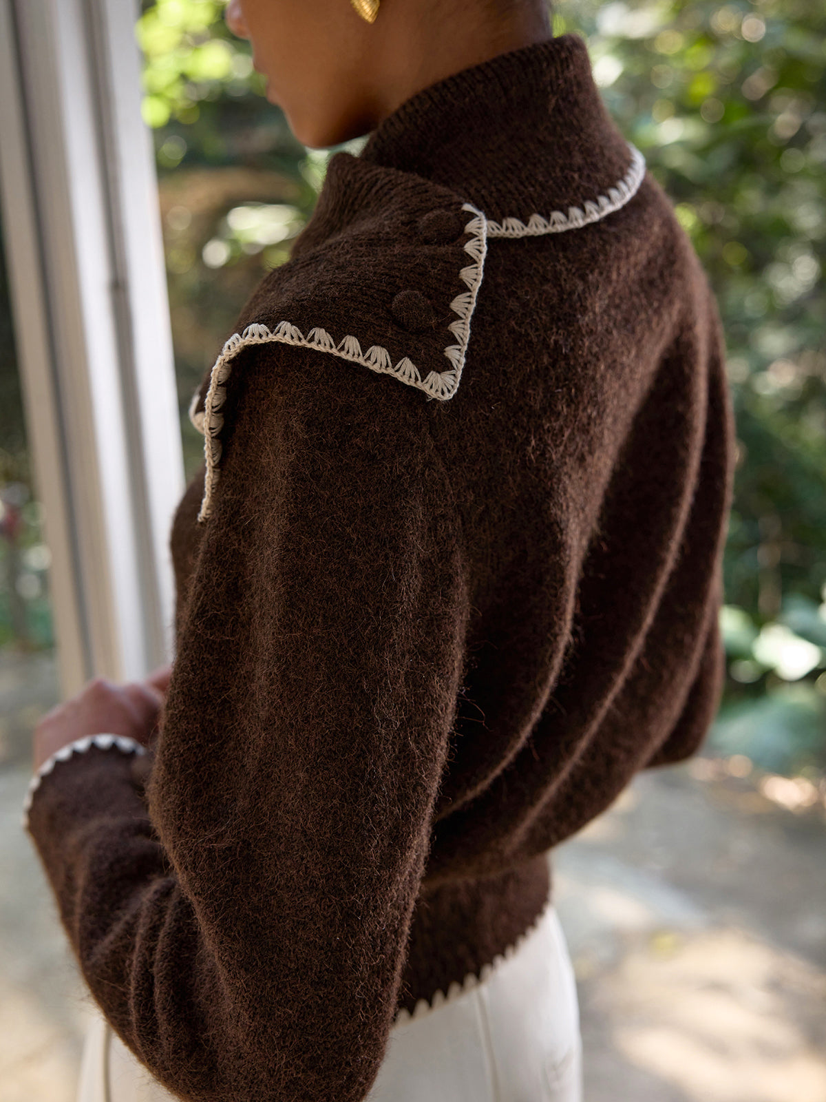 Armelle brown and cream cardigan, close-up of the cream crochet shell edging