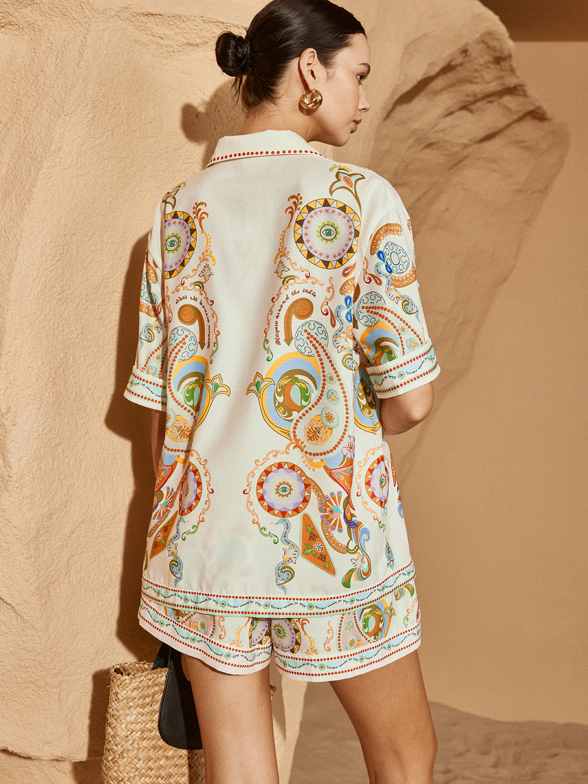 Back view of the paisley print camp-collar shirt and shorts set