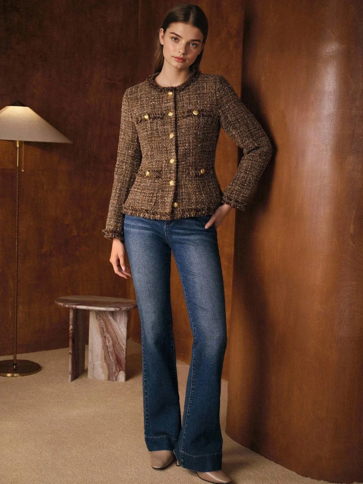 Camille brown tweed jacket worn with flared jeans, full-length view