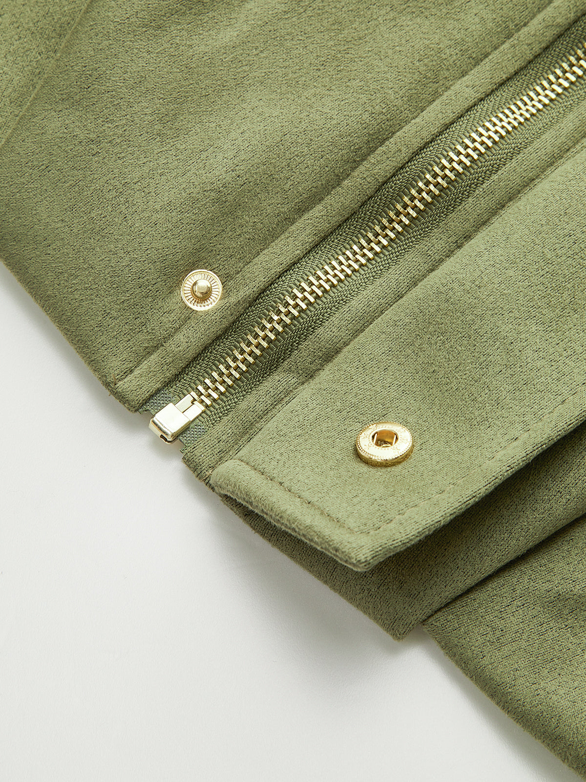 Charline green oversized wide-sleeve jacket, close-up of gold snap studs on the zip placket