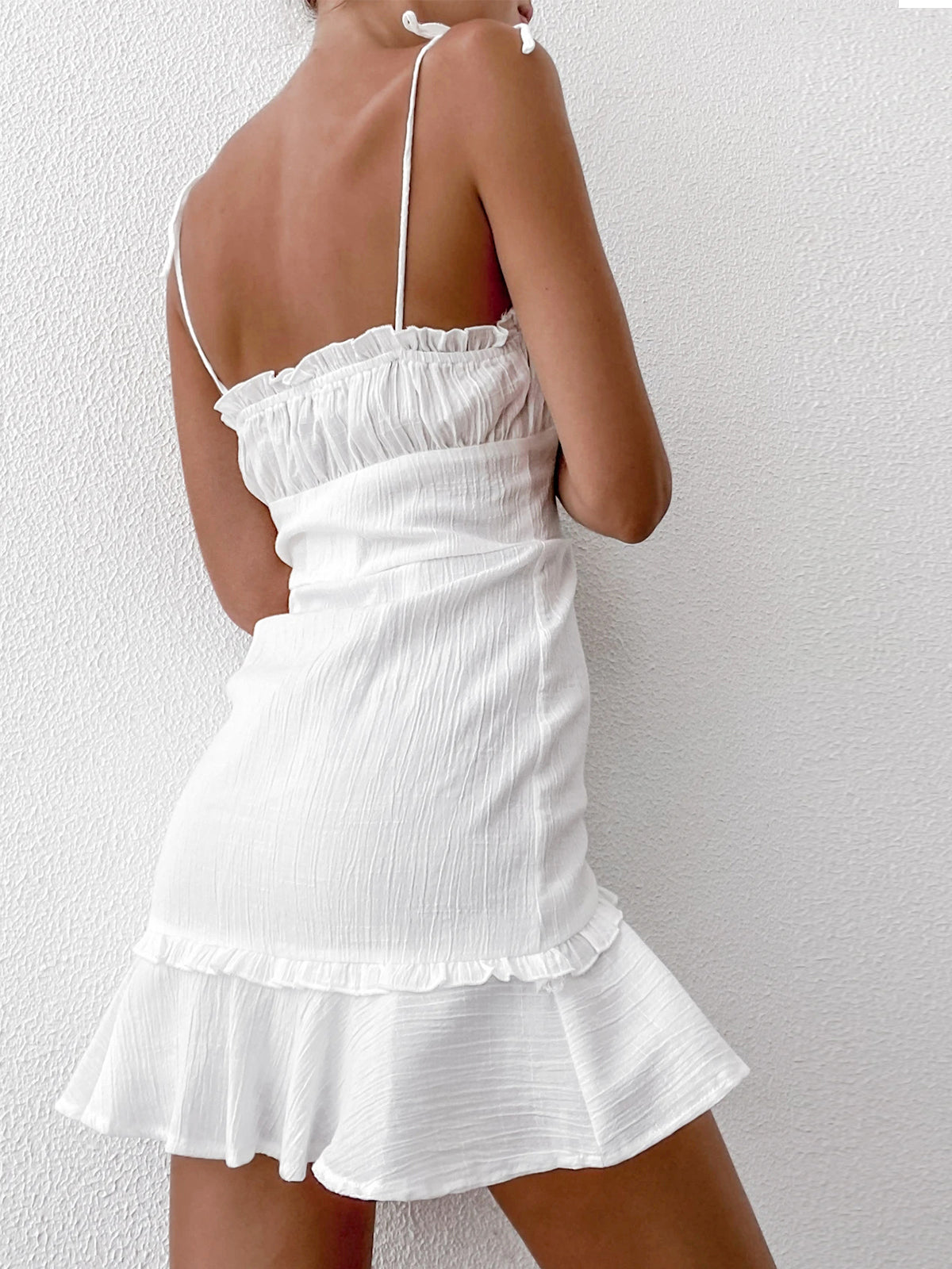 Clarisse white mini dress, straight ruffle-trimmed back, back view