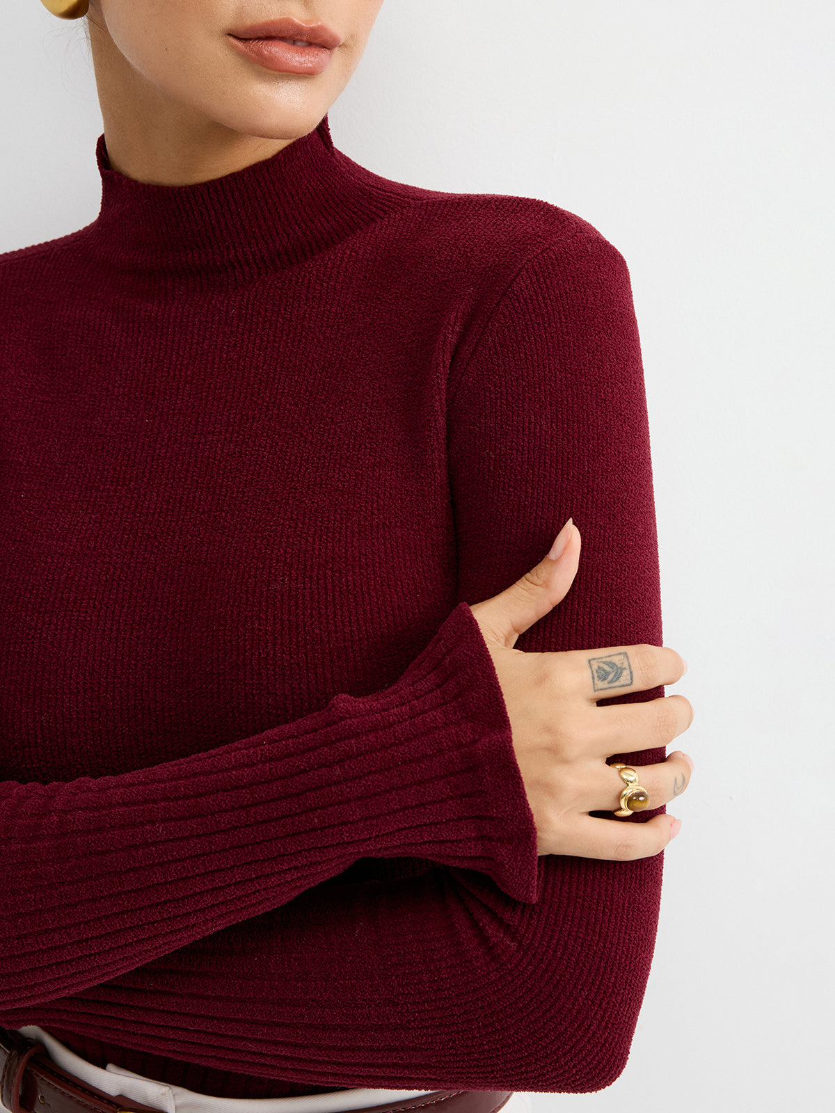 Danielle burgundy ribbed mock neck top, close-up of the mock neck collar and bell cuff