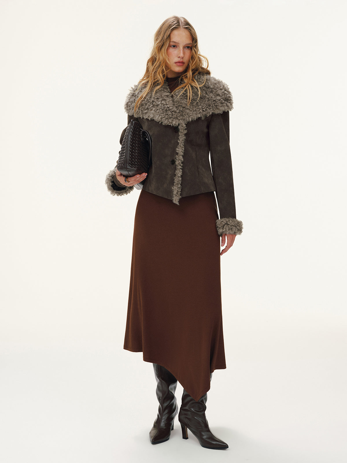 Dorothee brown faux fur trim fitted jacket styled with a long brown skirt, full-length front view