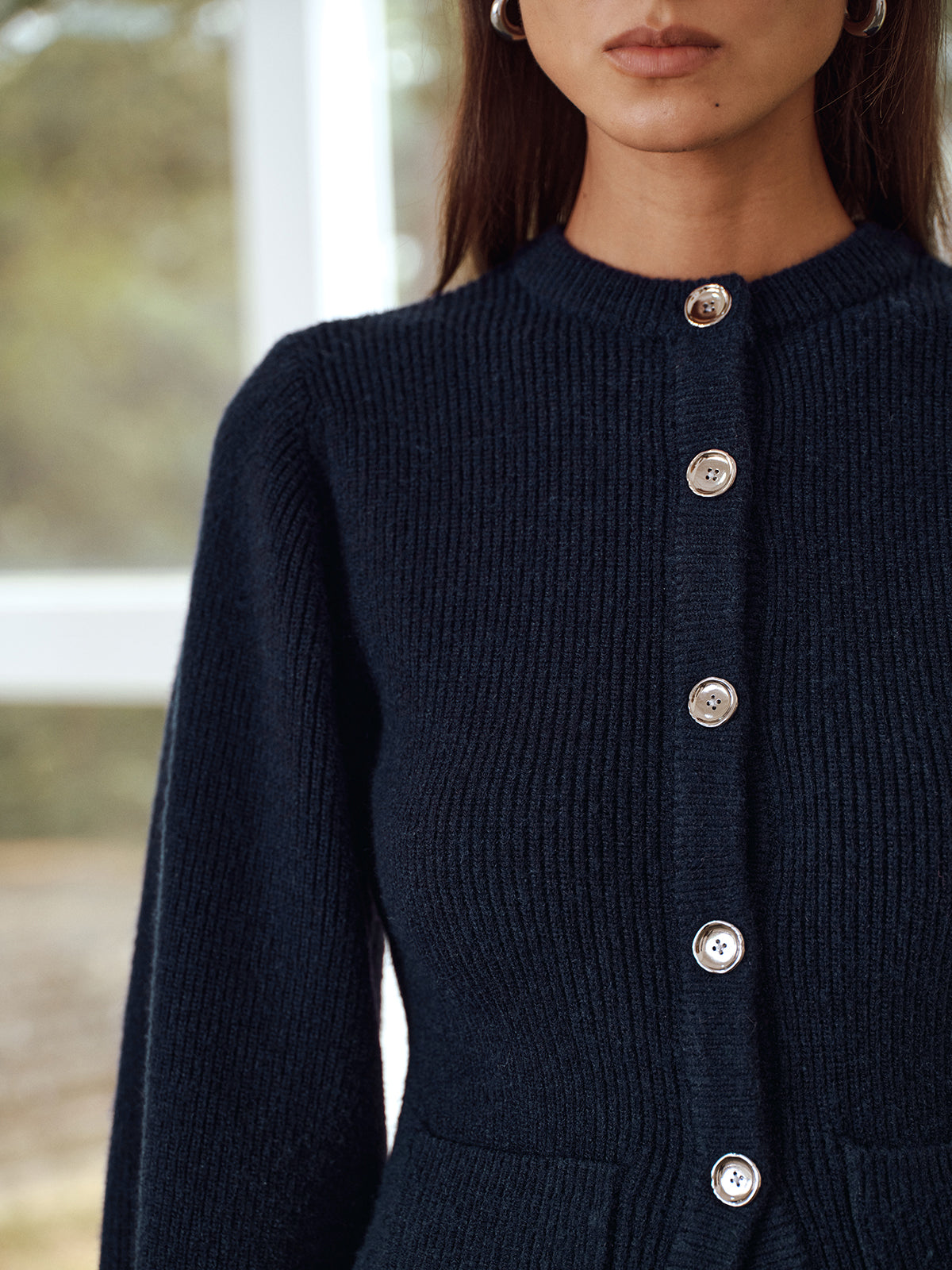 Ernestine navy cardigan, close-up of the silver-tone buttons