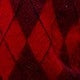 Close-up of the diamond argyle pattern on the Faustine sweater