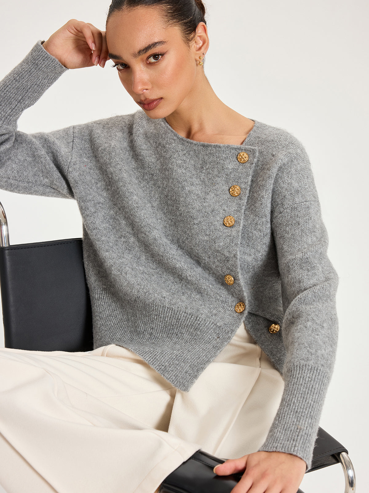 Genevieve gray asymmetric gold-button cardigan, seated close view