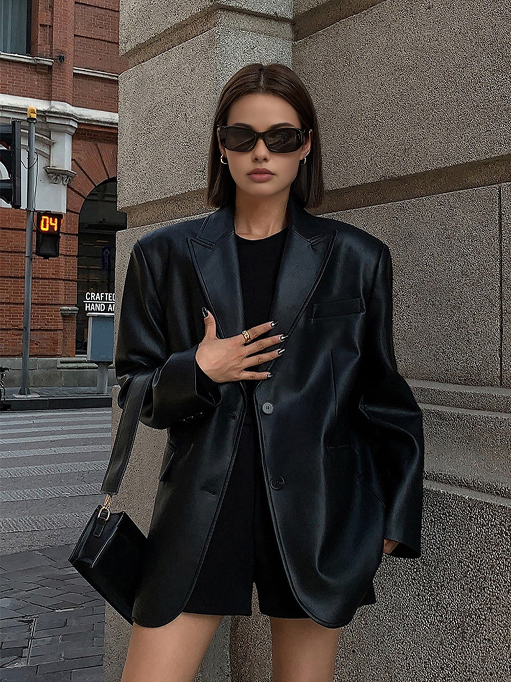 Huguette Black peak lapel blazer, front view showing the chest welt pocket