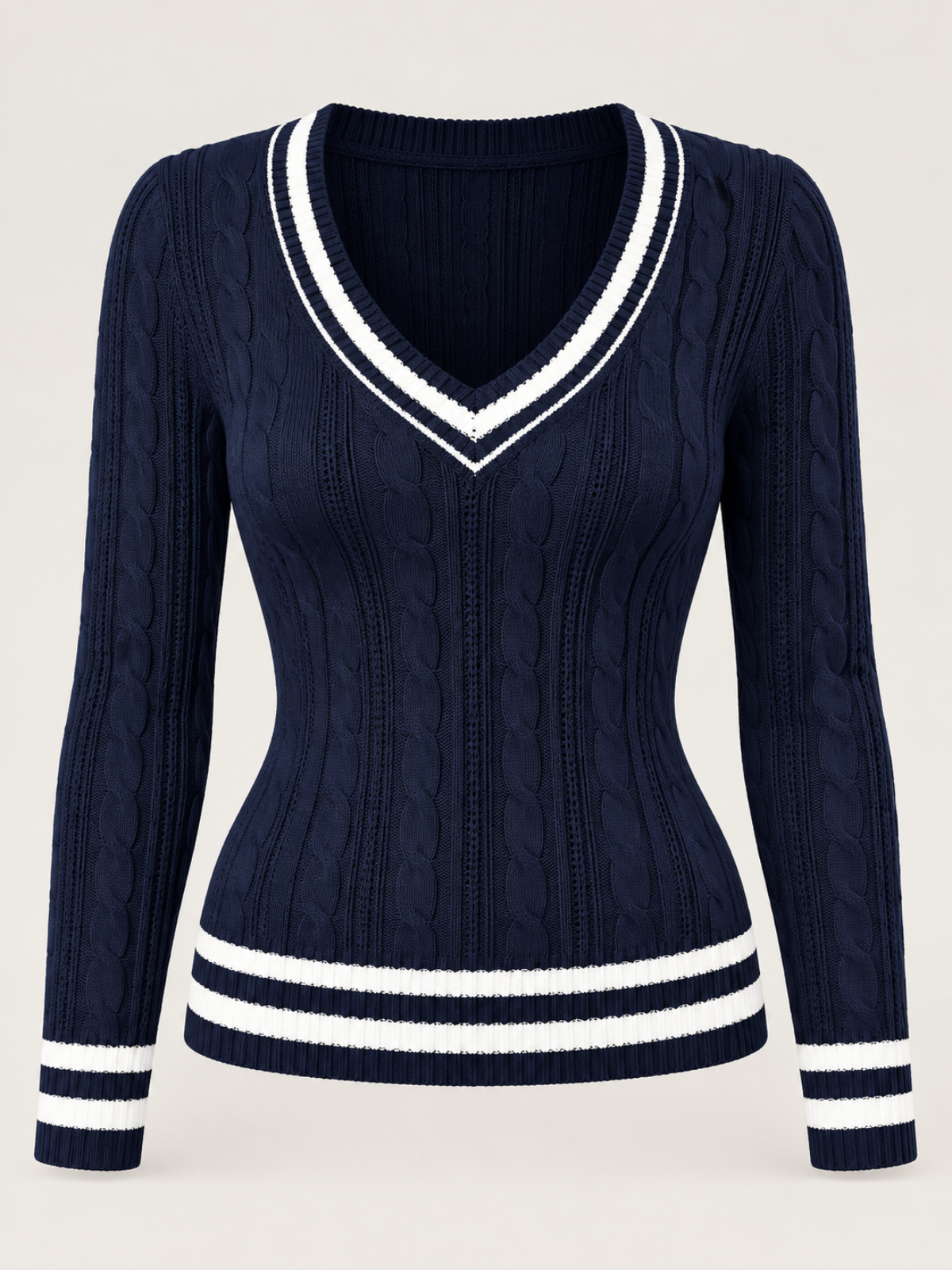 Isabelle navy cable knit sweater shown flat, deep V-neck with striped trim
