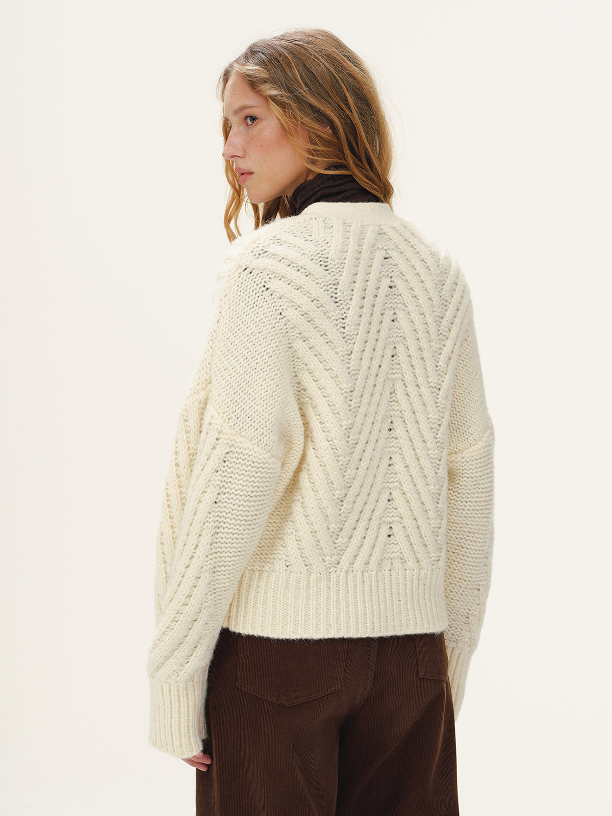 Isaure cream chevron chunky knit cardigan, back view showing the chevron