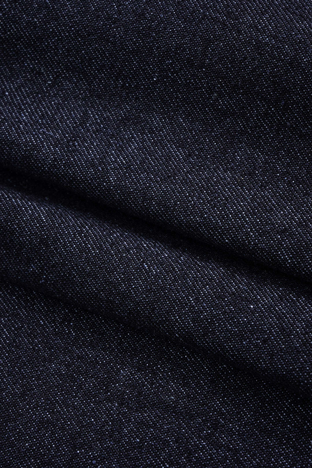 Jeanne blue denim jacket, close-up of the denim weave