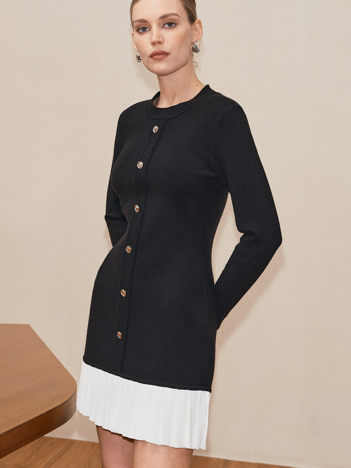 Laetitia black and white pleated hem knit mini dress, side view