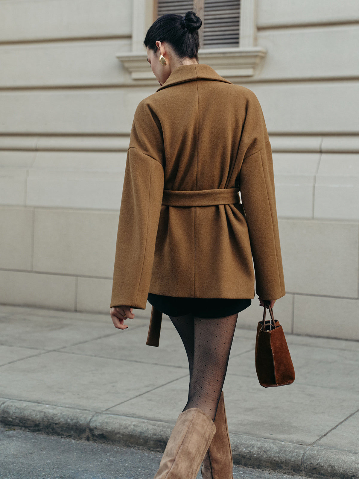 Leopoldine camel wrap coat tied at the waist, side view