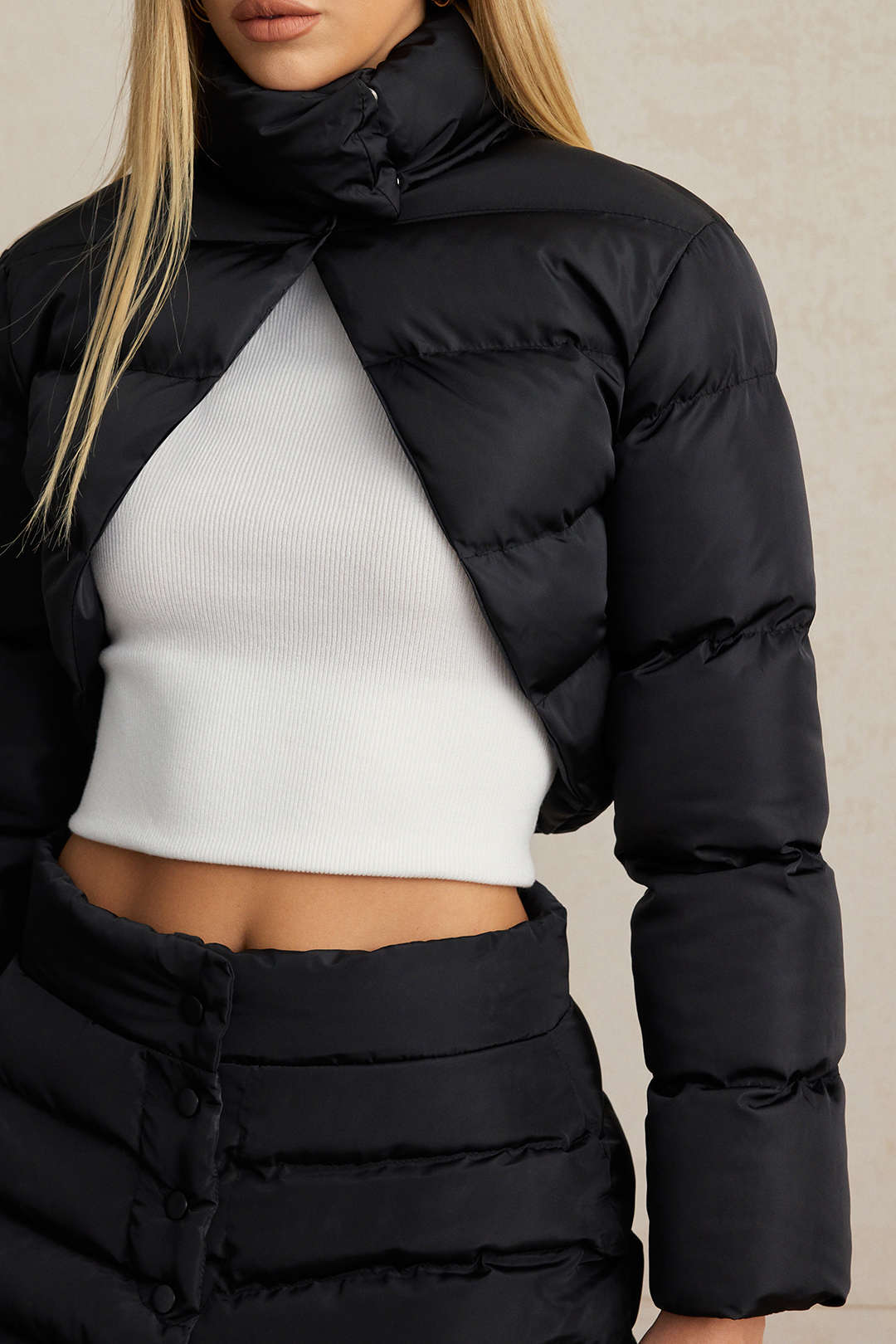 Maelle black quilted high-neck jacket, close front view