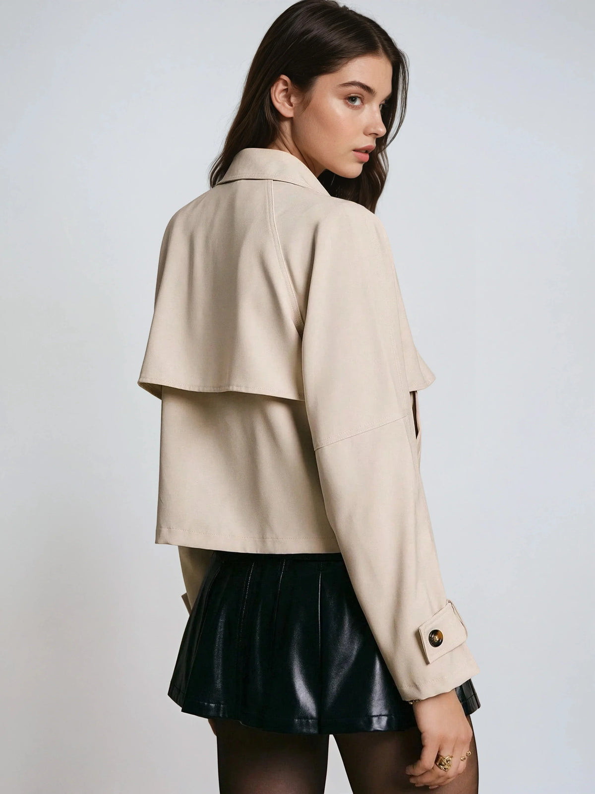 Marguerite light beige cropped jacket, back view showing the storm flap