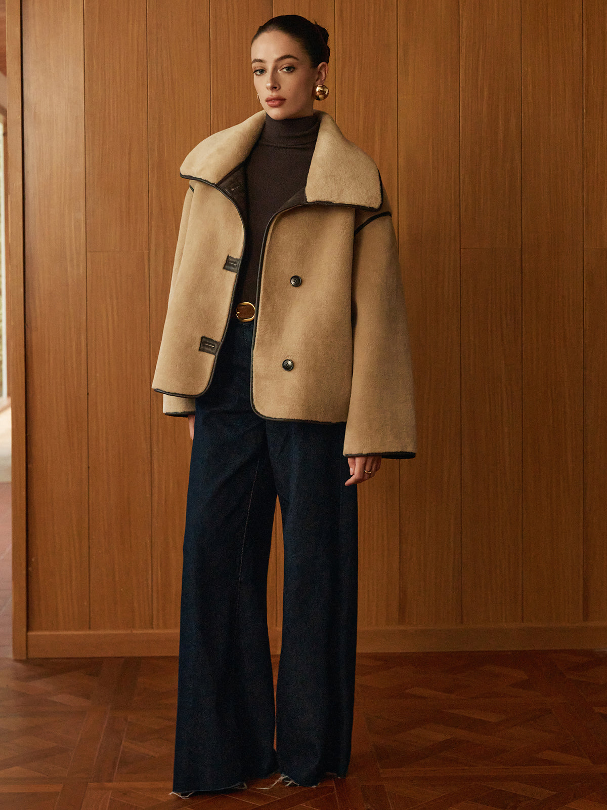 Beige deep-pile jacket styled with wide-leg trousers, front view