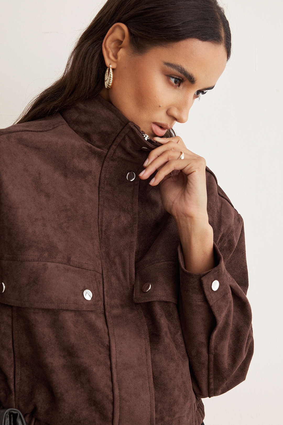 Nicole coffee jacket, close-up of the high collar and button front