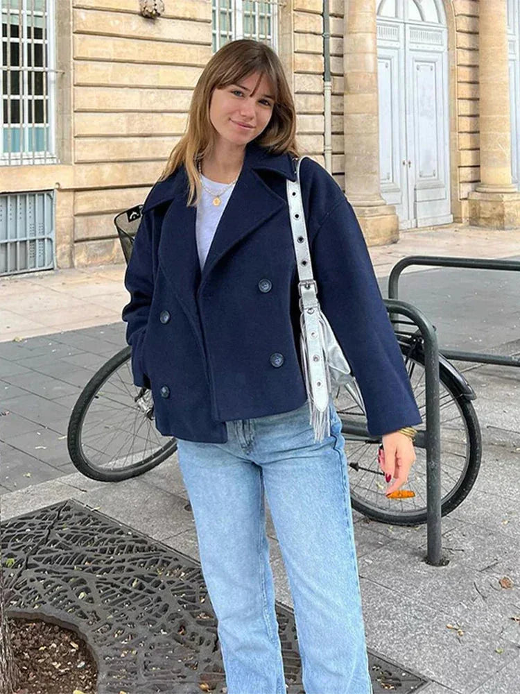 Odile navy cropped peacoat worn open, full-length view