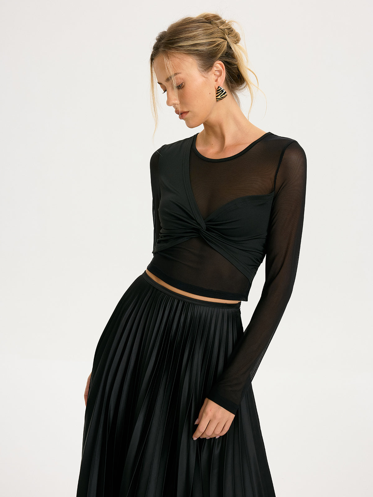 Ondine black twist-front top styled on model