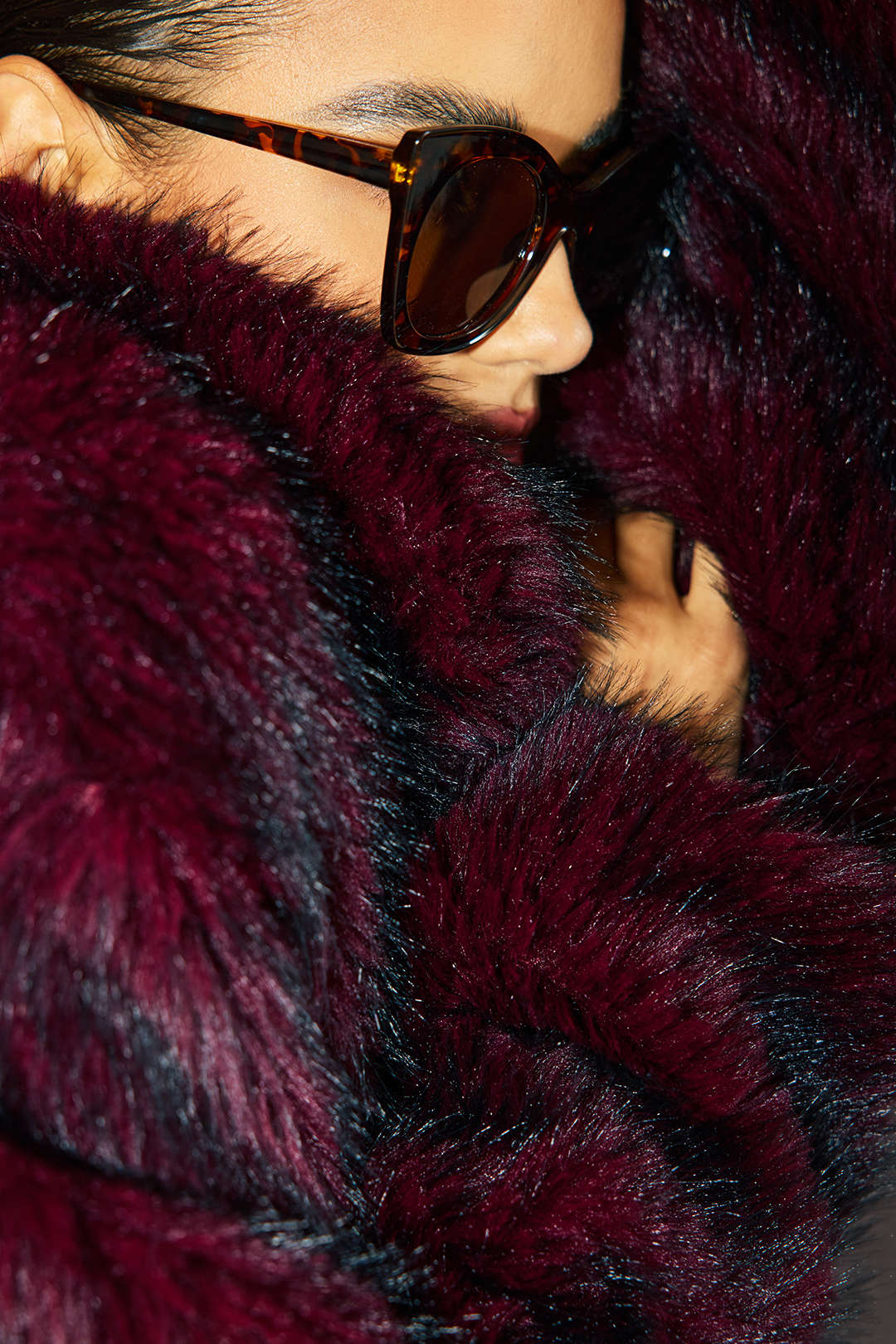 Palmyre burgundy faux fur coat, side view