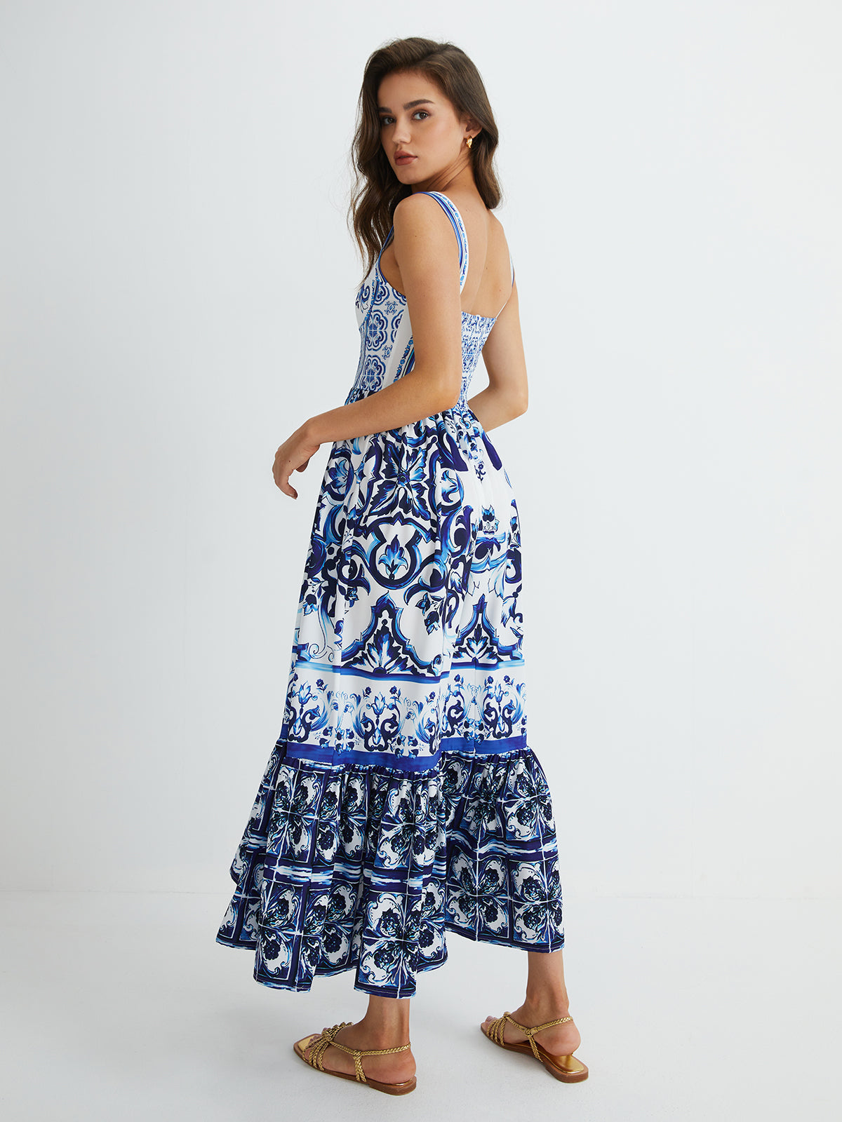 Penelope blue and white maxi dress, back view showing the smocked back panel