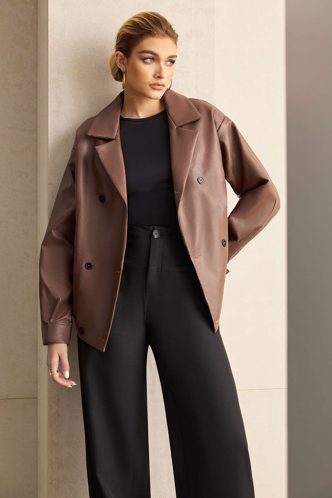 Brown wide-lapel jacket with a double-breasted button front, front view