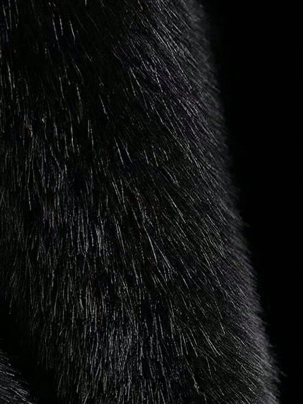 Close-up of the dense black faux fur pile
