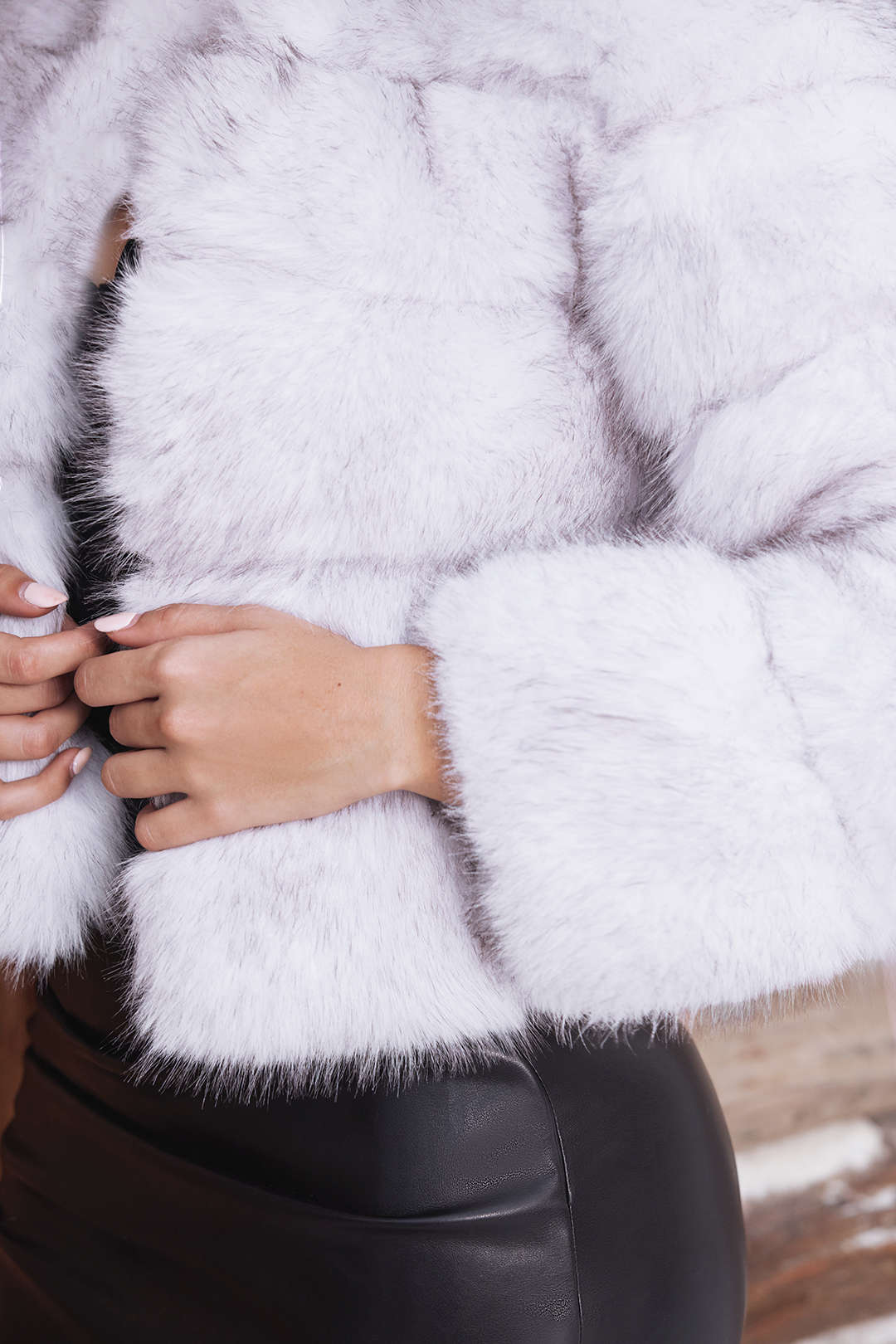 Tatiana white faux fur jacket, close-up of the sleeve and collarless front