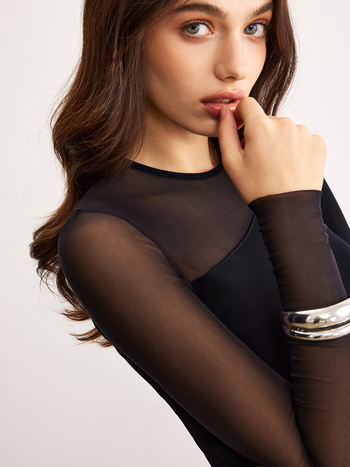 Black asymmetric blouse, long sleeve detail