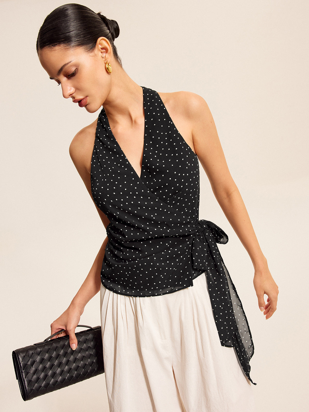 Black polka dot halter top, full-length view