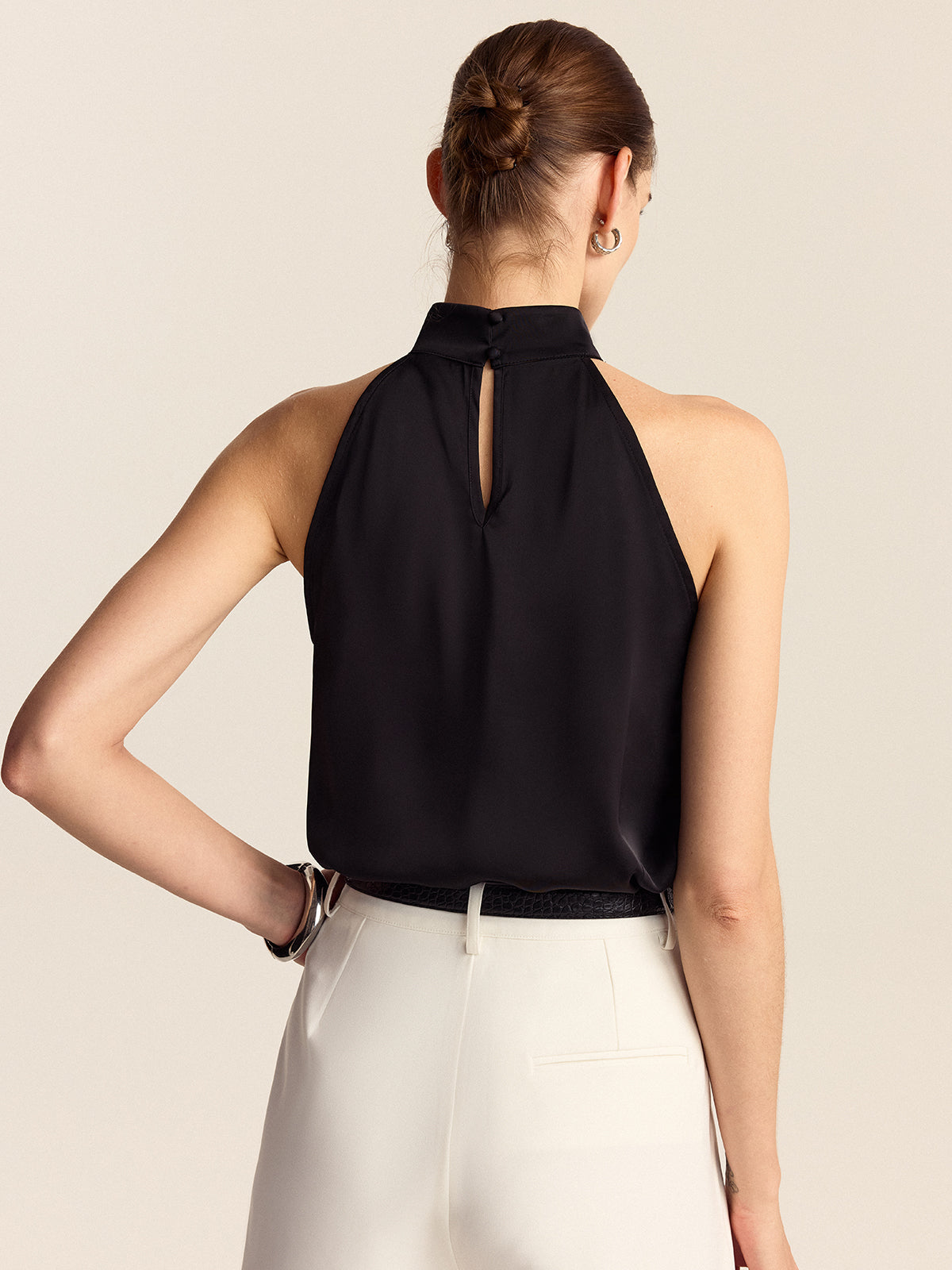Black satin high-neck top, styled view