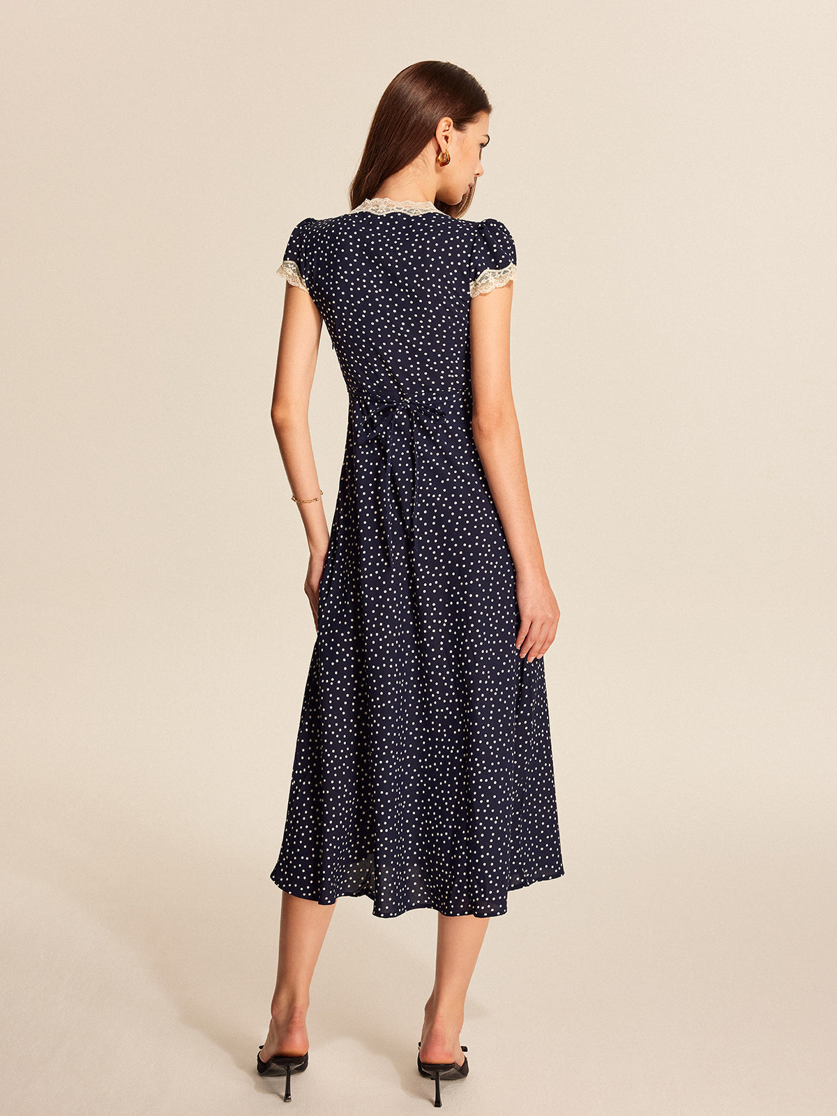 Blue ruched midi dress, sleeve and hem detail