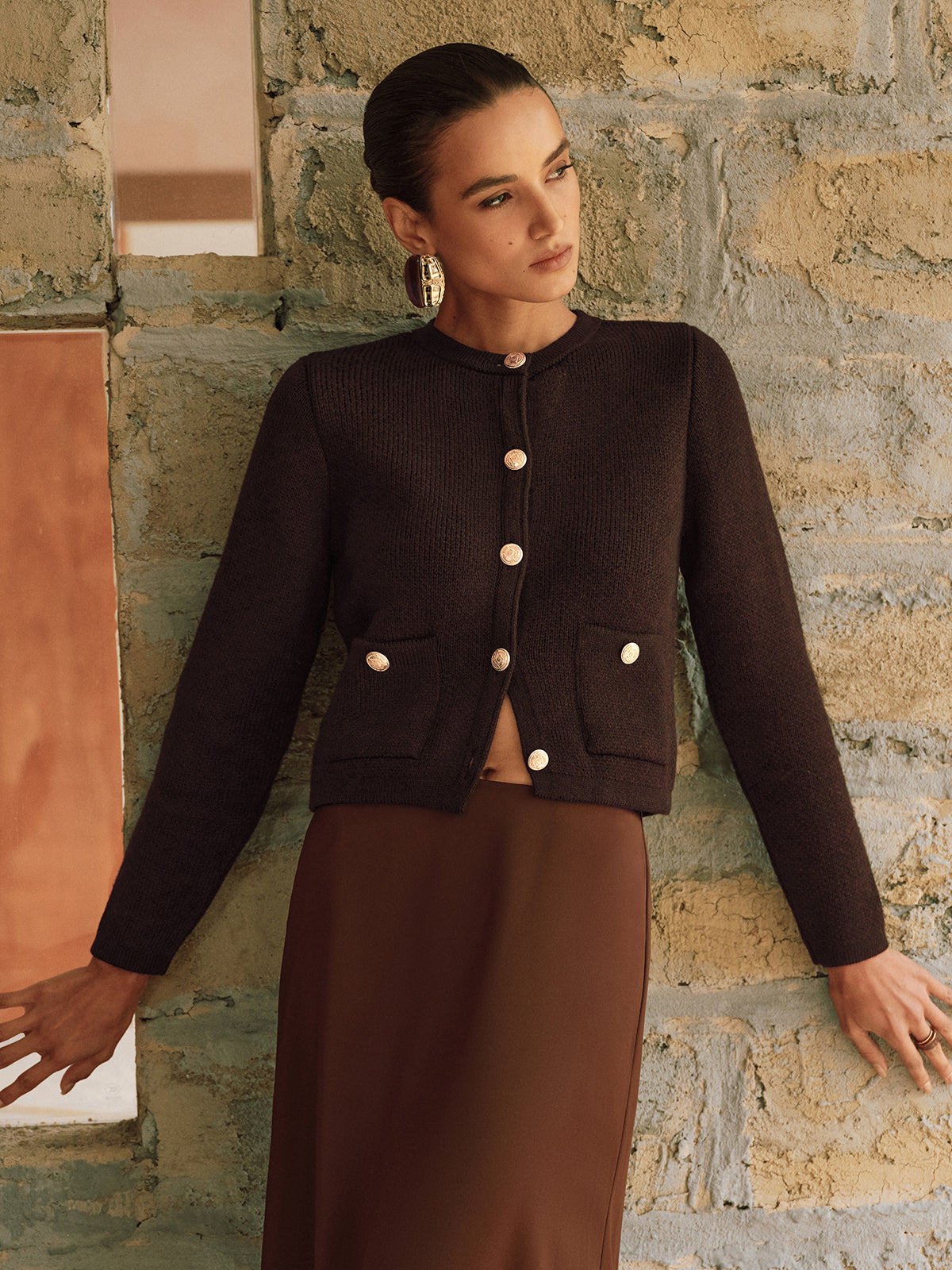 Adrienne brown gold-button cropped cardigan worn open, front view
