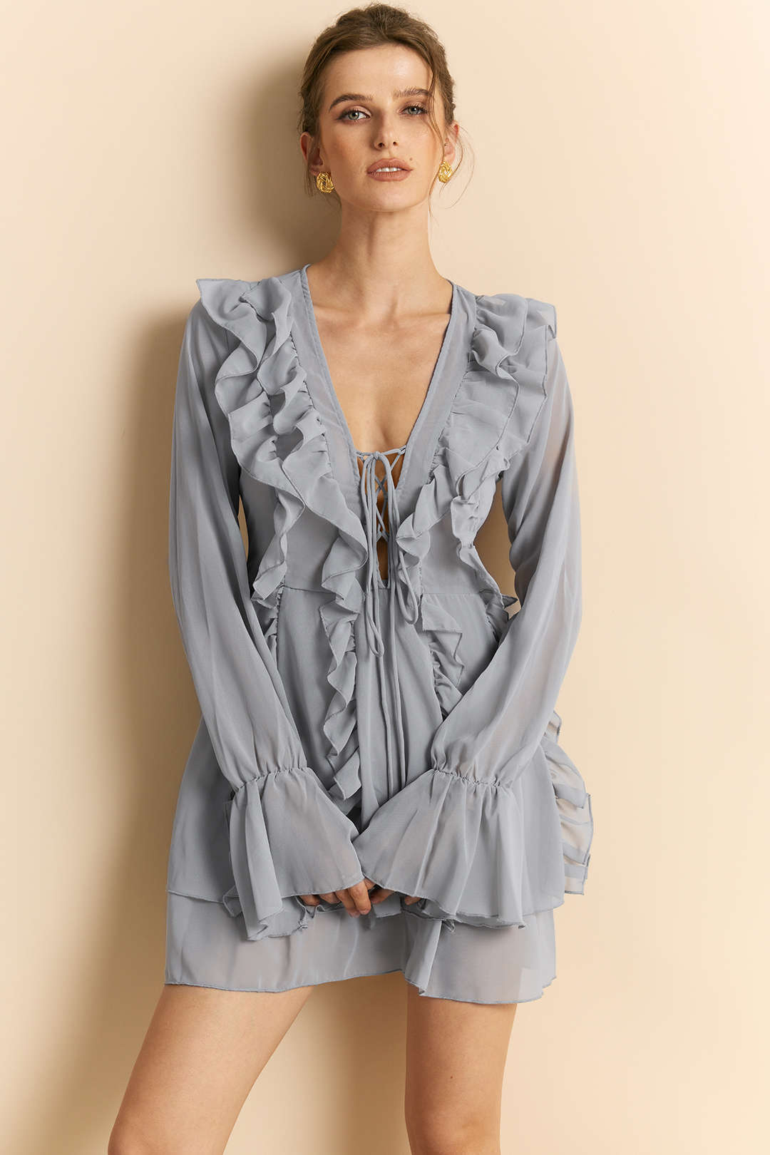 Amelie gray ruffle mini dress with V-neck tie, front view