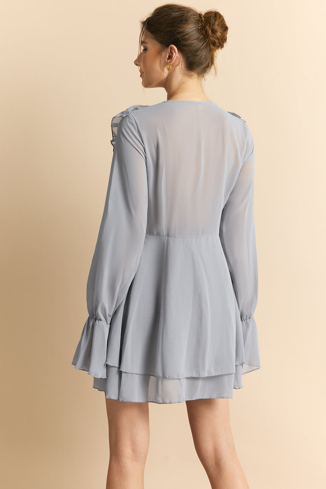 Amelie ruffle mini dress neckline and tie detail close-up