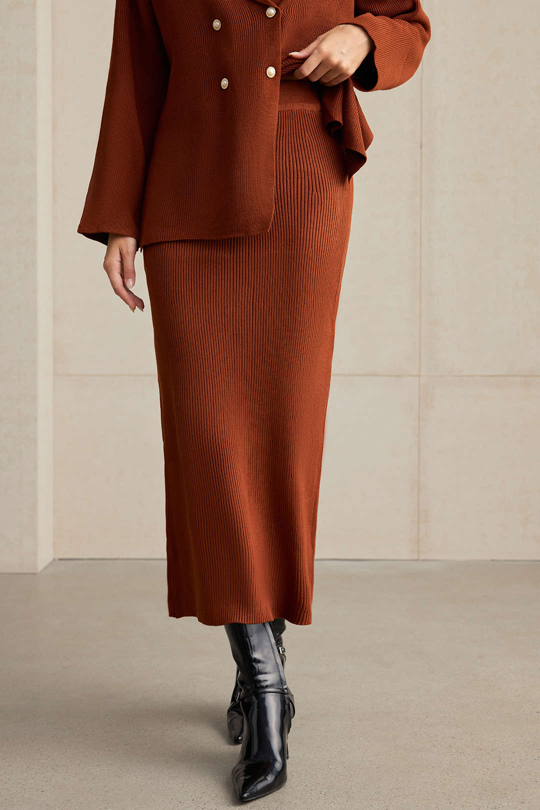 Full-length view of the Anceline rust knit blazer and ribbed midi skirt set