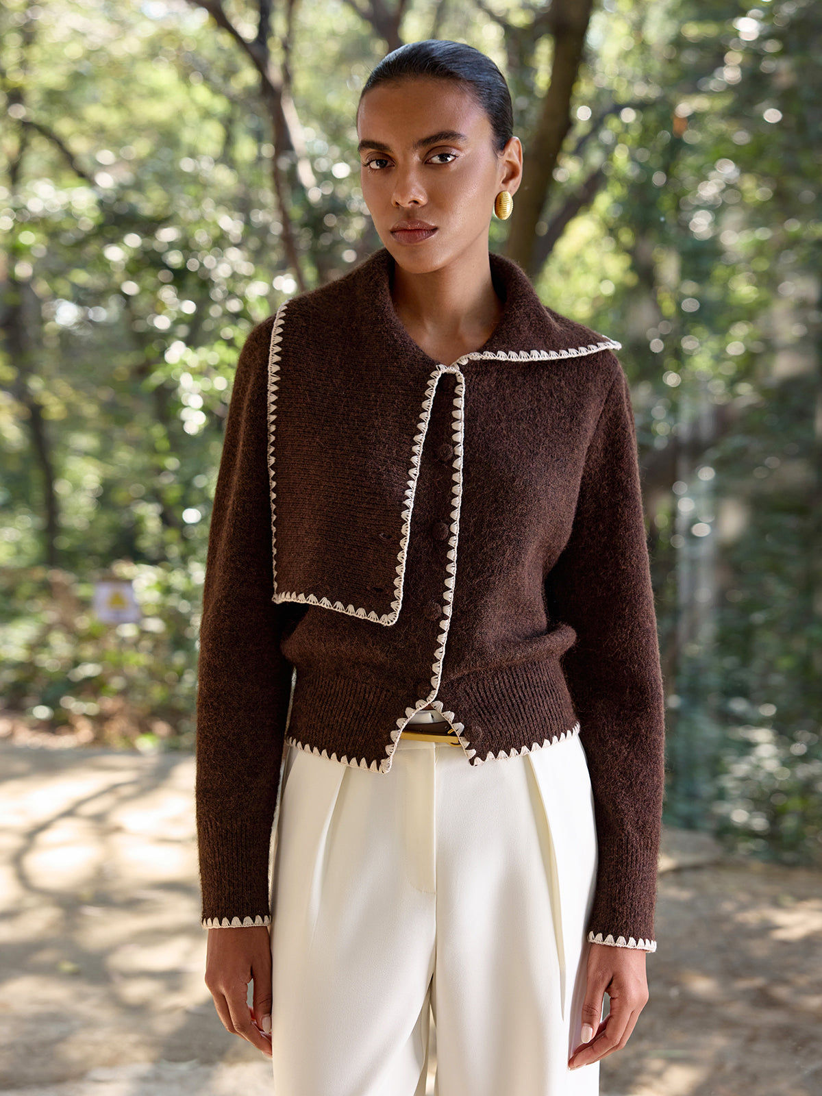 Armelle brown and cream cardigan with the collar folded flat and wide