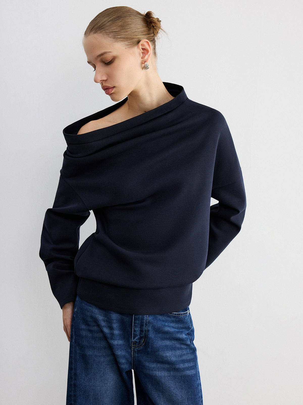 Augustine navy asymmetric off-shoulder sweatshirt, front view at waist length