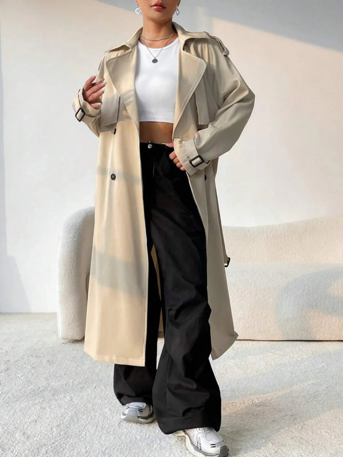 Aurore beige longline trench coat worn open, front view