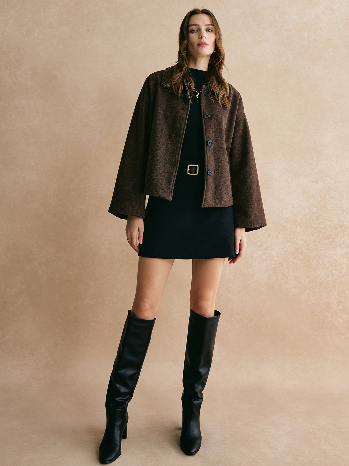 Bettina brown oversized button-front jacket, full-length front view of the boxy hip-length cut