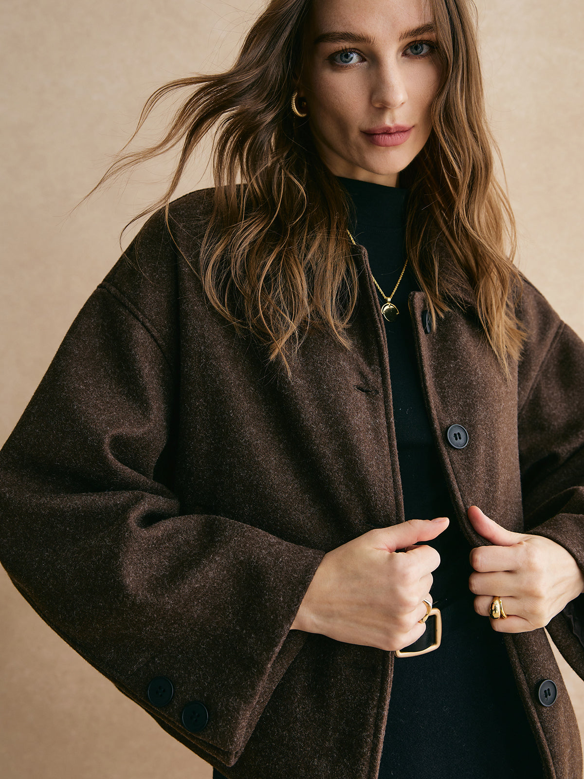 Bettina brown oversized button-front jacket close-up on the stand collar, buttons and wide cuff