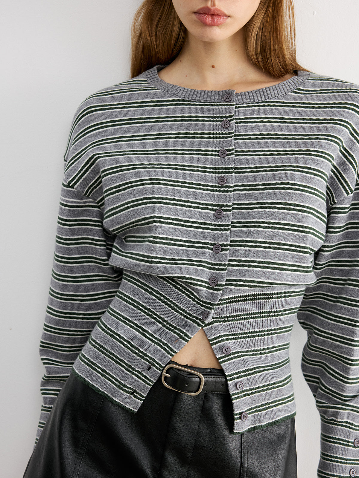 Blandine gray and green striped cardigan, close-up of the button placket