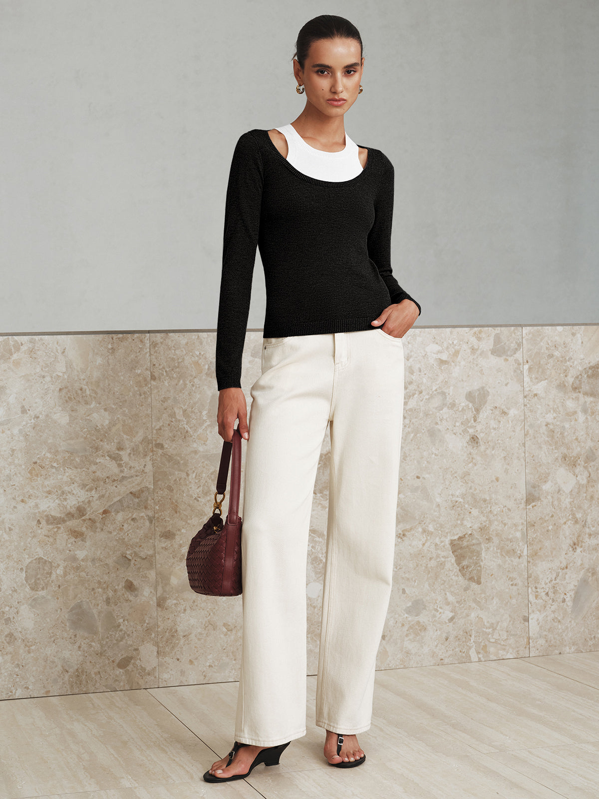 Carine black layered shoulder cutout knit top, full-length front view