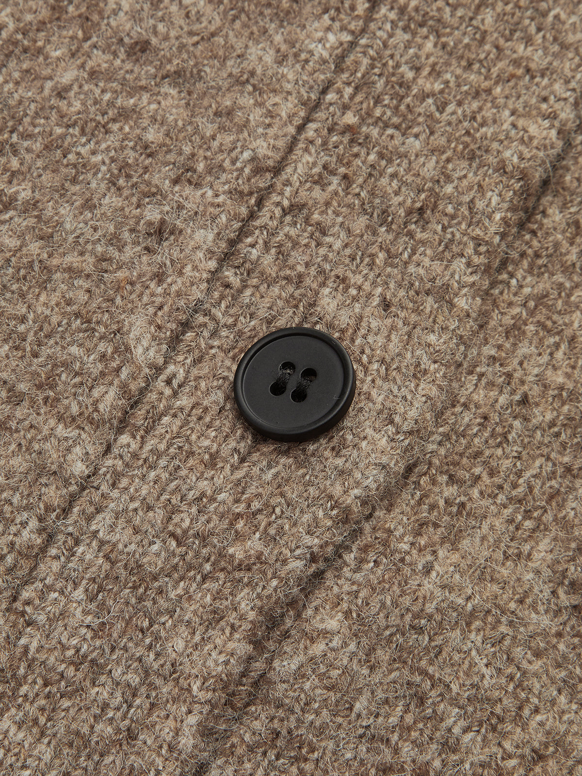 Carole taupe wool cardigan, close-up of the dark four-hole button