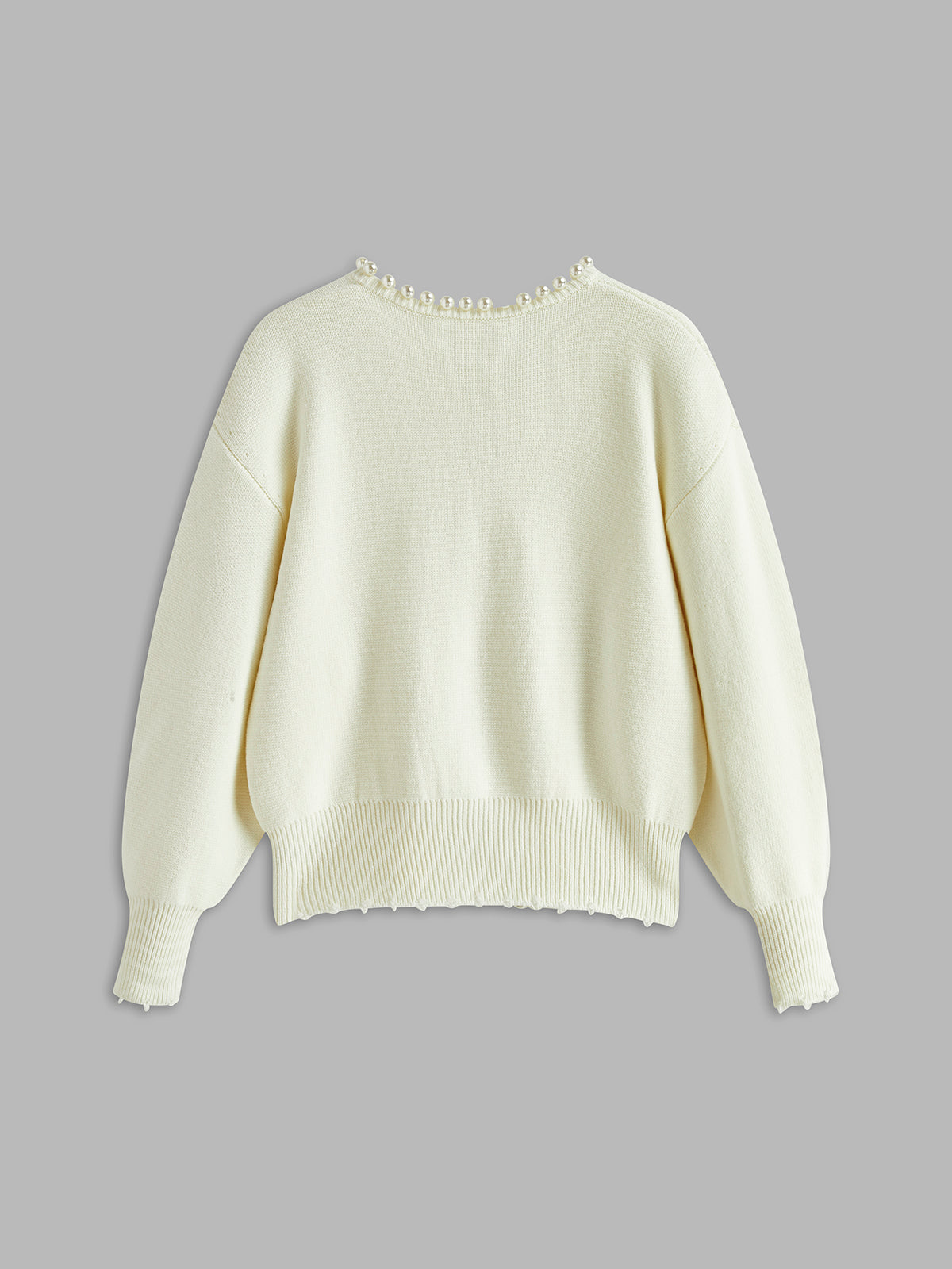 Cream pearl-trim cardigan, flat back view