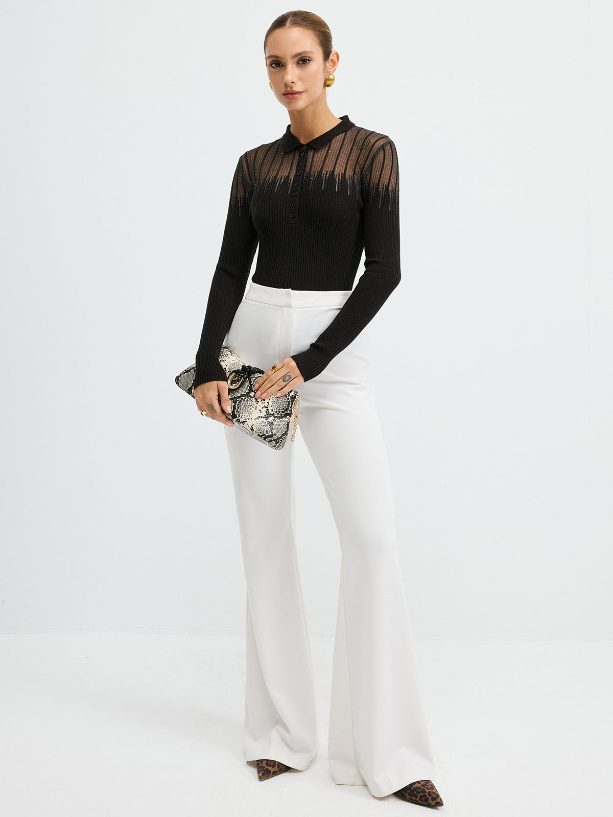 Christelle black sheer yoke knit polo top, full-length front view