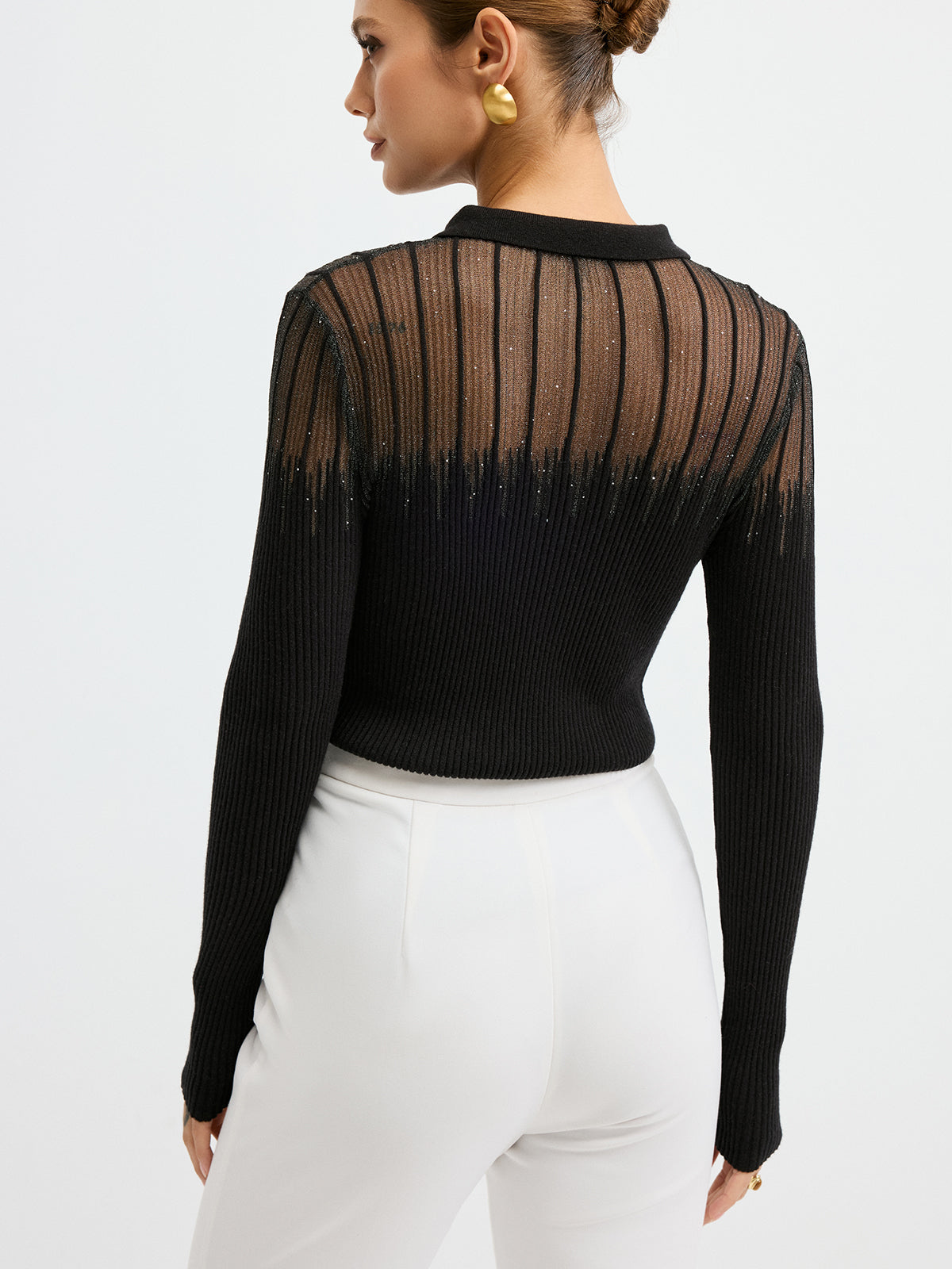 Christelle black sheer yoke knit polo top, back view showing the sheer upper back