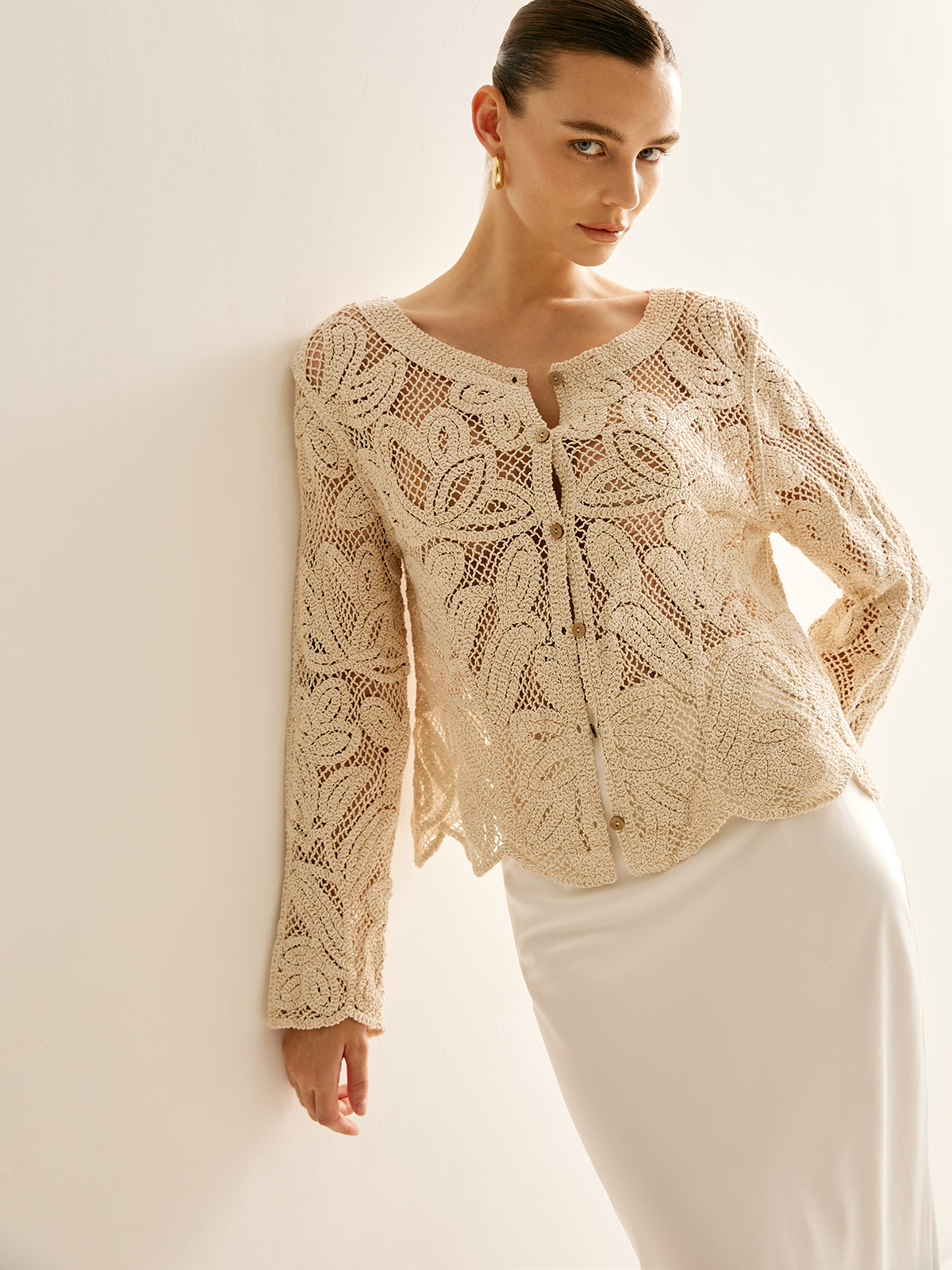 Cosette beige crochet openwork cardigan fully buttoned, front view