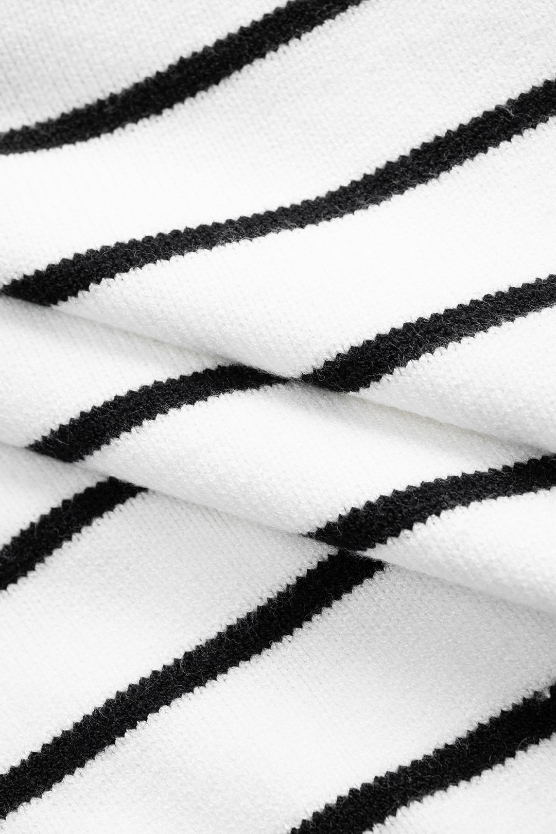 Denise white and black Breton stripe cardigan, close-up of the striped knit