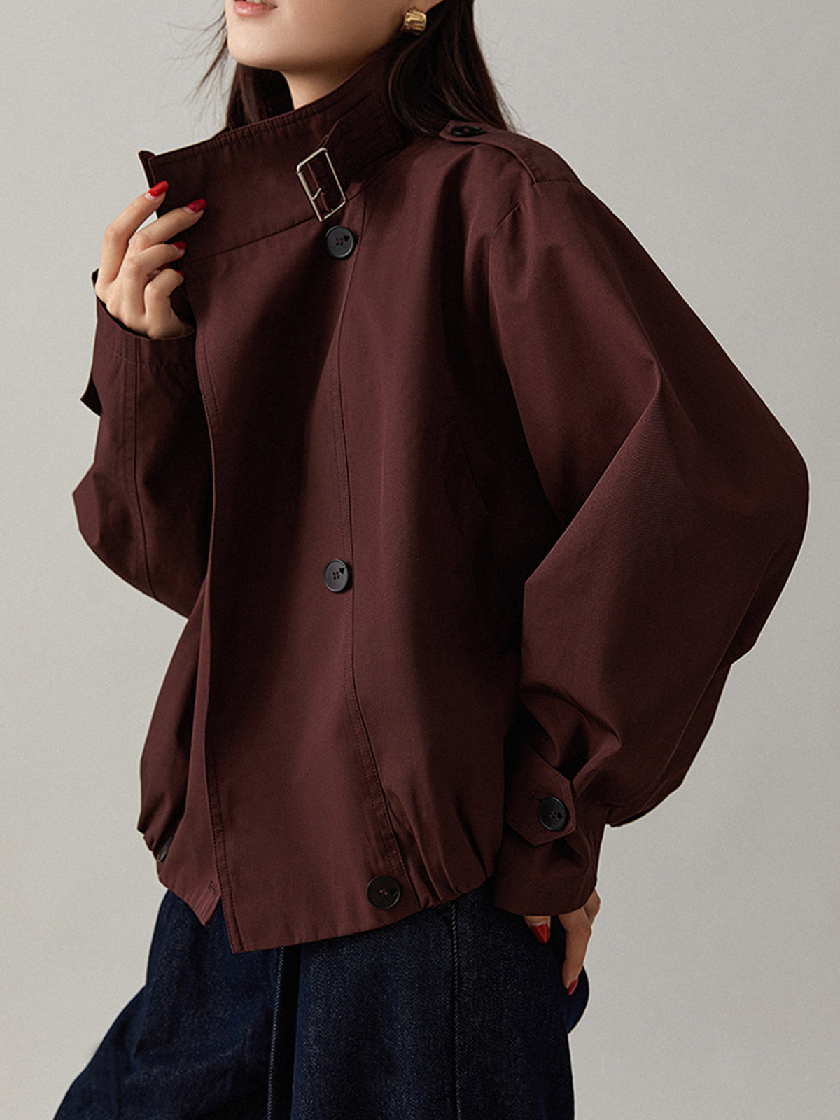 Edmee Maroon cropped jacket, close-up of the buckled collar strap and funnel collar